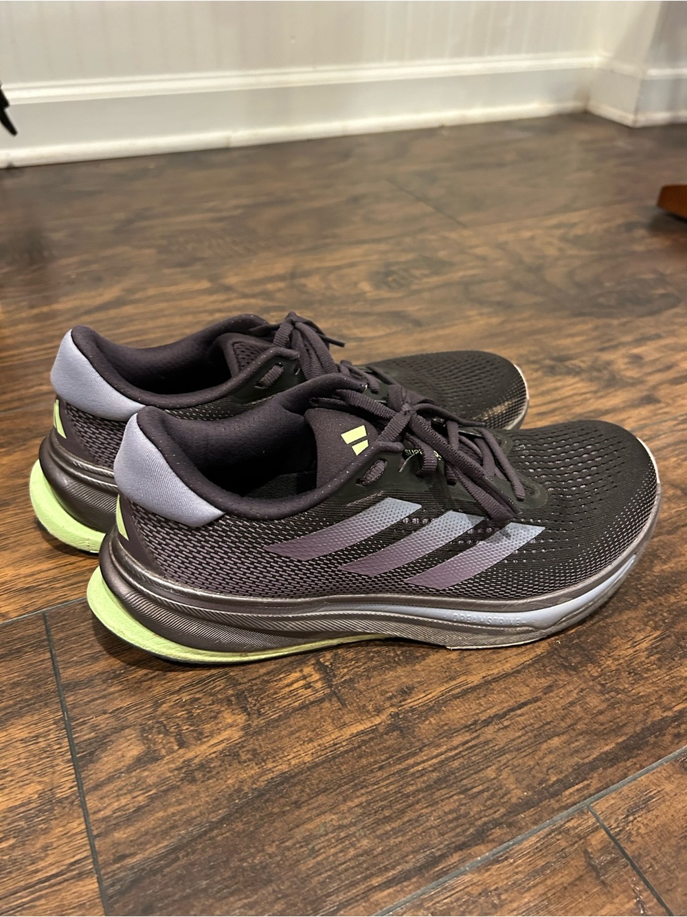 adidas Black Supernova Running Sneakers with Pale Purple Stripes
